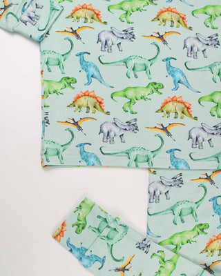 Lev Baby Pajama Set - Landon
Children's pajama set with dinosaur pattern on a light blue background