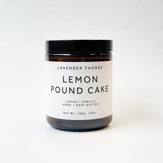 Lavender Thorne Lemon Pound Cake Body Butter moisturizer with a creamy texture and lemon scent, displayed in a jar.