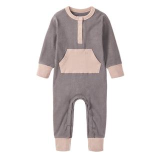 Little Bipsy Colorblock Ribbed Romper - Graphite
Gray baby onesie with beige accents on a white background