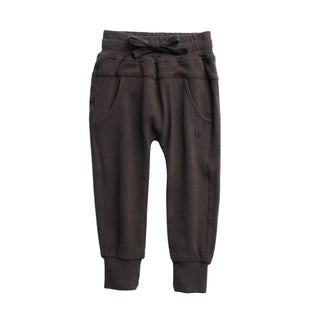 Little Bipsy Joggers - Brown 
Dark brown jogger sweatpants with an elastic drawstring waist, side pockets, and ribbed ankle cuffs, shown flat on a white background.