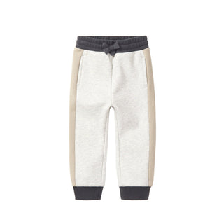 Little Bipsy Side Stripe Jogger - Stone Grey
Two-tone pants with a white front and beige sides on a white background