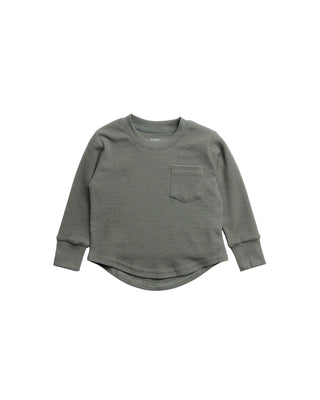 Little Bipsy Waffle Top - Green
An olive green long-sleeve crewneck shirt with a chest pocket, laid flat on a light gray background.