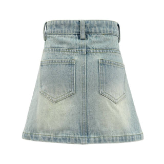 Lola & the Boys Cutie Bows denim skirt with colorful bow details and classic five-pocket design, styled on a mannequin.