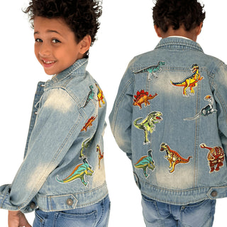 Lola and The Boys Dino Lovers Denim Jacket
A child model shown from the front and back wearing a light-wash denim jacket decorated with colorful embroidered dinosaur patches. The image features a clean white background and displays both the front profile and back view of the garment.
