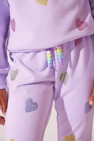 Lola and The Boys Lavender Crystal Hearts Set
Lavender tracksuit with heart patterns on a light background