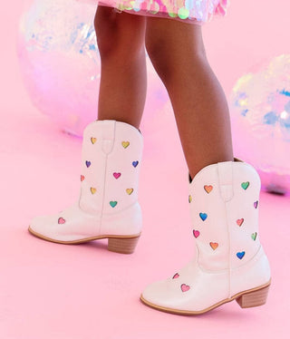 Lola and The Boys Pastel Ombre Hearts Cowgirl Boots
White cowboy boots with colorful heart patterns on a pink background