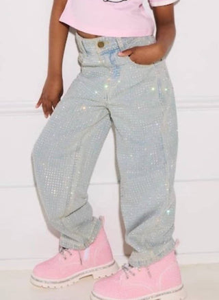 Lola and The Boys Sparkle Crystal Denim Jeans
Person wearing sparkly gray jeans and pink shoes on a white background