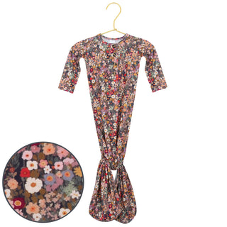 Lou Lou and Company Knotted Gown - Gracie
Floral-patterned baby wrap on a hanger with a close-up inset showing the pattern.