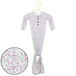 Lou Lou and Company Knotted Gown - Lily
Floral-patterned baby dress on a hanger with a close-up of the fabric detail.