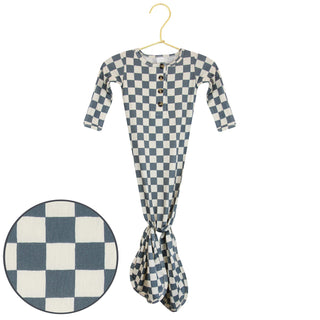 Lou Lou and Company Knotted Gown - Miles
Checkered baby outfit on a hanger with close-up of checkered pattern.