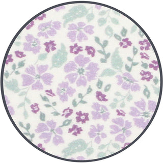 Lou Lou and Company Headband
Round rug with a floral pattern featuring purple and green flowers on a white background.