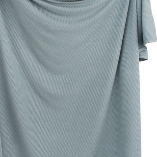 Lou Lou and Company Ribbed Swaddle Blanket - Ford
Close-up of a ribbed fabric in a light gray color on a white background