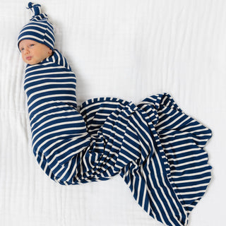 Lou Lou and Company Ribbed Swaddle Blanket - Jack
Newborn baby wrapped in a blue and white striped swaddle on a white background