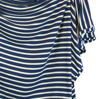 Lou Lou and Company Ribbed Swaddle Blanket - Jack
Navy and white striped shirt with rolled-up sleeves on a white background