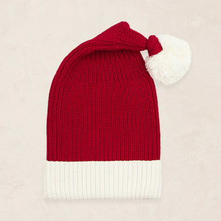 Lou Lou and Company Santa Beanie
Red and white knit hat on a beige background