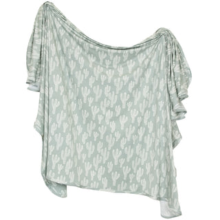 Lou Lou and Company Swaddle Blanket - Knox
Light green blouse with white cactus pattern on a white background