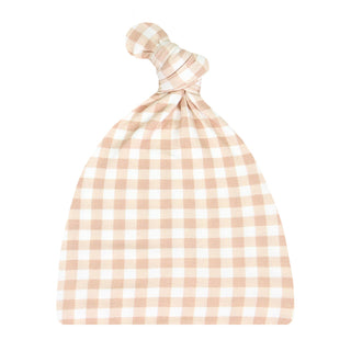 Lou Lou and Company Top Knot Hat - Milo
A baby knit hat in a beige and white gingham check pattern, featuring a knotted top detail, shown against a plain white background.