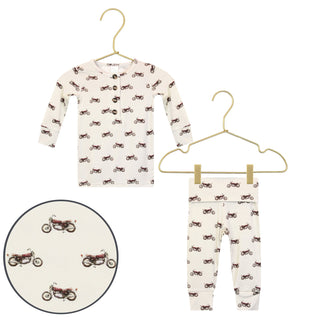 Lou Lou and Company Top and Bottoms - Cruz
Children's pajama set with motorcycle pattern on hangers against a white background