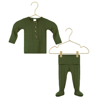 Lou Lou and Company Top and Bottoms - Riley
Green baby shirt and pants set on hangers against a white background