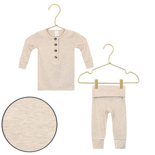 Lou Lou and Company Top and Bottoms - Ryan
Beige baby shirt and pants on hangers with close-up detail on a white background