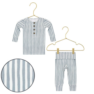 Lou Lou and Company Top and Bottoms - Tatum
Striped shirt and pants set on hangers with close-up of fabric texture.