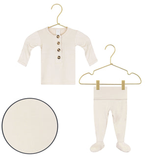 Lou Lou and Company Top and Bottoms - Winnie
Baby outfit with shirt and pants on hangers against a white background