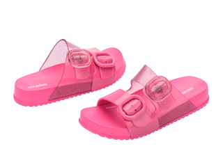 Mini Melissa Cozy Slide Kids - Pink / Glitter
Pink sandals with clear straps on a white background