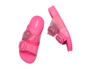 Mini Melissa Cozy Slide Kids - Pink / Glitter
Pink sandals with clear straps on a white background