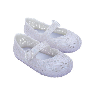 Mini Melissa Pollen - Pearly Blue
White baby shoes with a strap on a white background