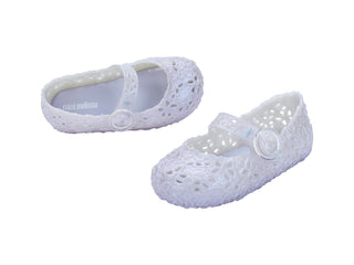 Mini Melissa Pollen - Pearly Blue
White baby shoes with a visible brand name on a white background