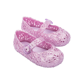 Mini Melissa Pollen - Pearly Pink
Pair of pink children's shoes with decorative straps on a white background