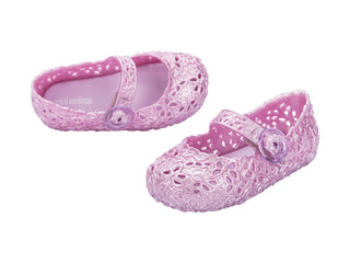 Mini Melissa Pollen - Pearly Pink
Pair of purple children's shoes with decorative design on a white background