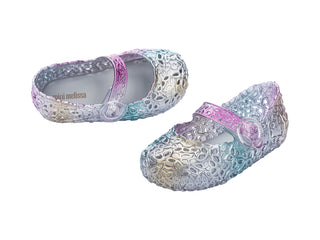 Mini Melissa Pollen - Multicolor
Pair of colorful children's shoes with floral pattern on a white background