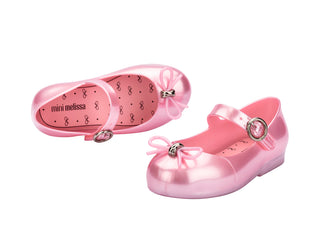 Mini Melissa Mini Sweet Love - Pearly Pink
Pink children's shoes with bow details on a white background