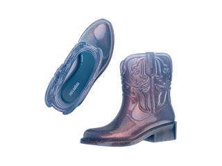 Mini Melissa Texas Kids Boot - Glitter Blue
Purple rubber boots with decorative patterns on a white background