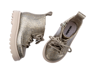 Mini Melissa Coturno Baby - Beige / Golden Glitter
Pair of glittery silver shoes on a white background