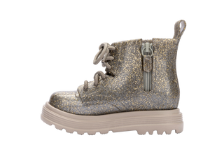 Mini Melissa Coturno Baby - Beige / Golden Glitter
Silver glitter boot with a platform sole on a white background