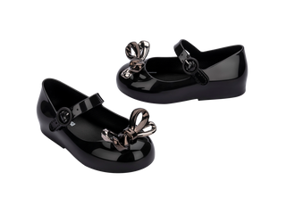 Mini Melissa Mini Sweet Love Glam - Black
Black patent leather shoes with decorative bows on a white background