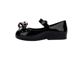Mini Melissa Mini Sweet Love Glam - Black
Black patent leather shoe with a bow on a white background