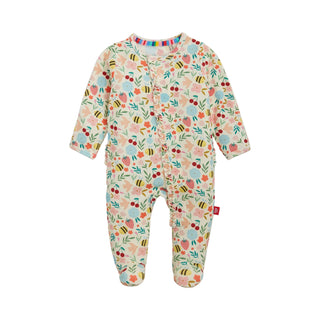 Magnetic Me Modal Footie with Ruffle - Honey Blossom
Floral patterned baby onesie on a white background