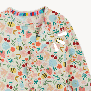 Magnificent Baby Magnetic Me Modal Footie with Ruffle in Honey Blossom, soft fabric, and adorable ruffle detail for babies.