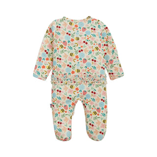 Magnetic Me Modal Footie with Ruffle - Honey Blossom
Floral patterned baby onesie on a white background