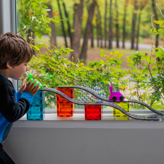 Magna-Tiles Downhill Duo 40-piece set of colorful plastic building tiles for creative play and construction.