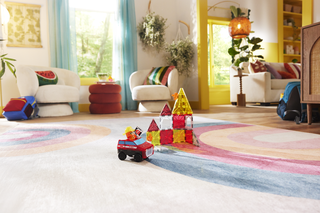 Colorful Magna-Tiles Fire Rescue 27-piece toy set featuring red and orange tiles for imaginative play and building fun.