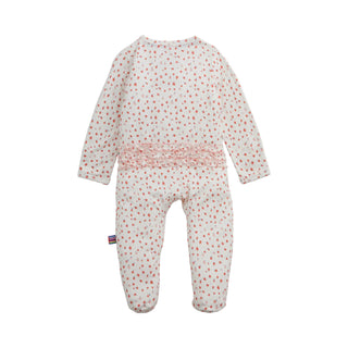 Magnetic Me Modal Footie with Ruffle - Apple Blossom
A baby footed sleeper with long sleeves and an all-over small red and green floral print on a white background, featuring a pink ruffle detail at the waist.