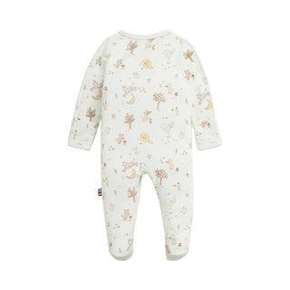 Magnetic Me Modal Magnetic Footie - Bedtime Rhymes
A baby footed one-piece jumpsuit in cream white with a delicate all-over print of trees, flowers, and suns in muted brown and soft orange tones, shown against a light off-white background.