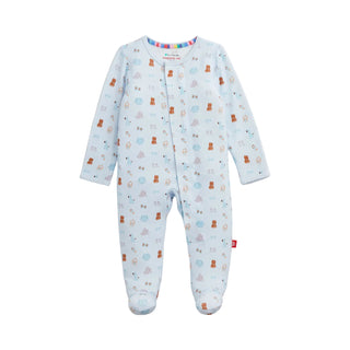 Magnetic Me Modal Magnetic Footie - Nursery Nostalgia Blue
A baby footed one-piece sleeper in light blue with a repeating pattern of small teddy bears and tents, shown flat on a light gray background.