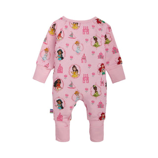 Magnetic Me x Disney Modal Convertible Coverall - Princess Royal Radiance
Pink baby onesie with princess and castle pattern on a white background
