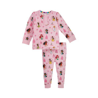 Magnetic Me x Disney Princess Modal Ruffle L/S Pajama Set - Princess Royal Radiance
Pink children's pajama set with princess and castle designs on a white background