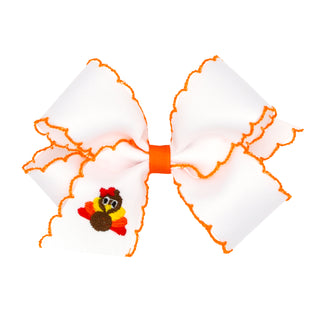 Medium Wee Ones Turkey Embroidered White Hair Bow on Clippie
Large white bow with orange trim featuring a small turkey design on a white background